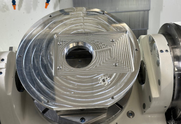 A plate machined on our YCM FX380A 5-axis vertical machining center