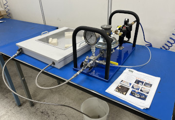 A custom hydrostatic testing station with instruction manual